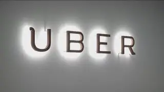 Business headlinse: Uber settles sexual harassment and Tesla stock is up