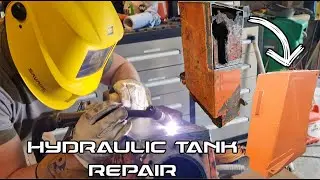 Repairing a excavator hydraulic tank
