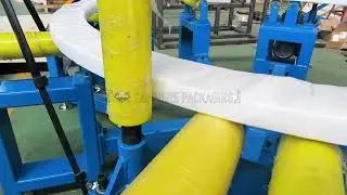 Horizontal coil wrapping machine
