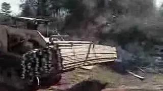 Extreme Pallet Forks for Skid Steer move wood