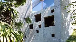 Tiny Concrete Bunker Opens to Reveal a 3 Story Home