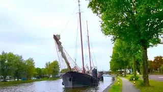 Go Baroque. Old  Dutch ship Samenwerking, Oosterbeek, 1905. Two-masted sailing ship.