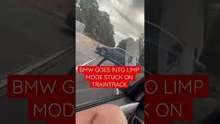 BMW gets stuck on train-tracks 🚂