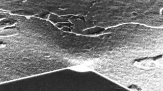 Nanoindentation using a Diamond Cube Corner inside the SEM