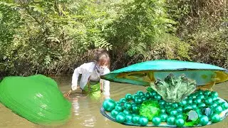 Riverside Riches Unveiled: Girl's Mutated Clam Finds Precious Pearls and Gems!
