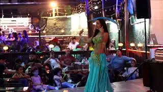 Jenaan belly dance - sword dance