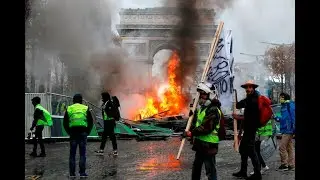 French police use teargas at protests over Macron, fuel taxes