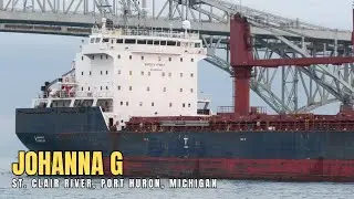 Salty Bulk Carrier Ship Passes Under the Blue Water Bridge