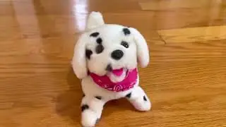 Walking and back flipping dalmatian dog toy￼