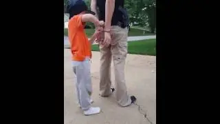 Child operating handcuffs