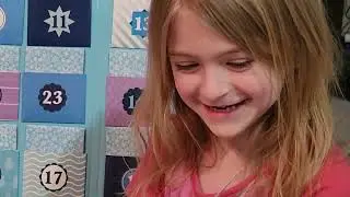 Scarlett opens all 24 books of the Frozen Disney Advent Storybook Christmas Calendar