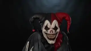 Jester, pale with red and black cowl with bells