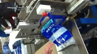 adult diaper packaging machine,adult diaper bagging machine,email:newlife@newlife3.com