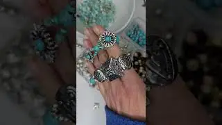 Creating handmade jewelry with two hole slider beads. 