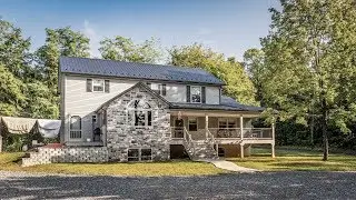 Amish House with Textured Black Metal Roof - A.B. Martin