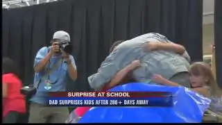 Soldier Surprises Children At Assembly