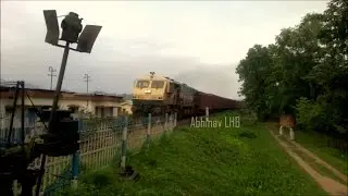 Honking, high notched, smoking EMD LKO WDG4 12209 with a heavy freight (BCNA) rake towards Lumding