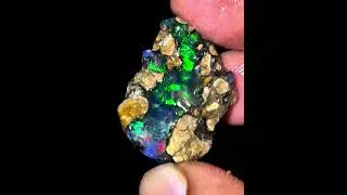 Natural Ethiopian black opal rough fire opal rough very nice quality rainbow fire tamble.