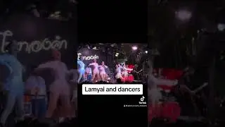Lamyai and full band dance on stage
