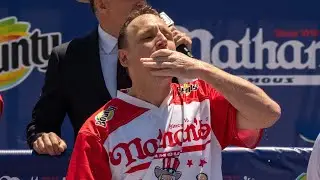 Joey Chestnut Returns to Nathan's Hot Dog Contest Amid PETA Protest!