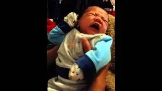 Baby Logan crying for his bottle
