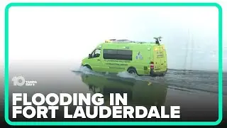 Fort Lauderdale airport emergency vehicle drives through flooded runway