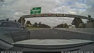 Melbourne's Sunny Day: A Scenic Drive Experience M1 Highway Melbourne Australia.