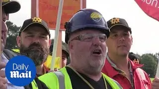 Workers protest Boris Johnson visit to Stormont in Belfast