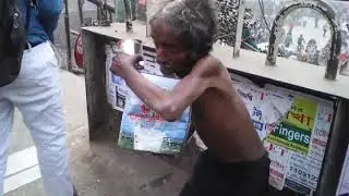 Hindi song sing with local instruments as music tools by Bangladeshi genius street beggar