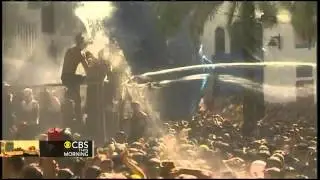 Tomato fight festival paints the town red