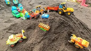 driving tractor and dumper truck uploading stone from tractor loading video 
