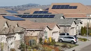 California regulators adopt new solar panel rules that reduce incentives to install