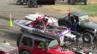 Boat launches onto Jeep at Webb's Slough St. John, WA