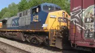 A standard cab Dash 8 leads Q249