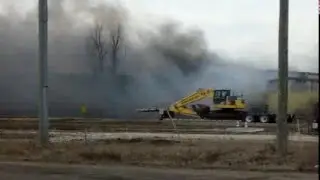 Fire continues to burn day after massive blaze at Shercom Industries