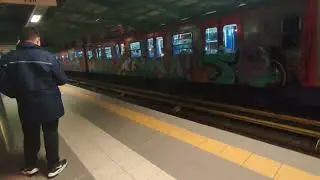 11th generation train arriving and departing Attiki station (line 1)