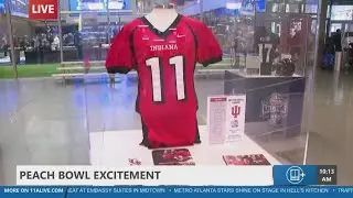 Fans flood Atlanta for Peach Bowl