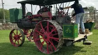 A very rare Abenaque hit and miss engine and a Case steam tractor powering a sawmill