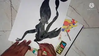 A Black fairy with butterfly // News paper pitcher//