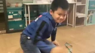 My daycare mate Kai zhe doing Akaza power and doma power!! (Funny)