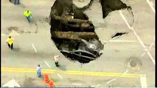 Car falls in Sink Hole, Ohio