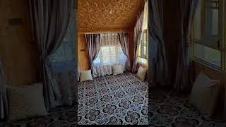 Turkish Wall to Wall Carpet with Imported Velvet Curtains installed on V shape windows..