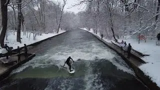River Surfing in Munich || Surfing on the Eisbach(Isar) || A snowy day English Garden, Germany[4K]