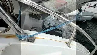 Securing the dinghy on Mariah