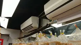 Panasonic air conditioner & midea table fan by bakery shop 