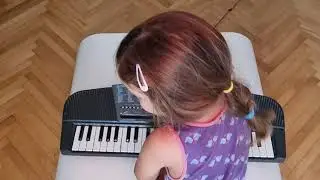 Kids playing with retro keyboard CASIO Tone Bank Ma-220