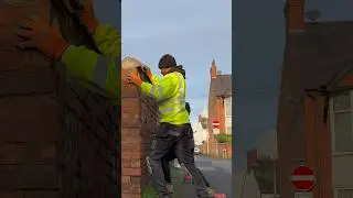 We managed to push this huge #brick #wall over!! #demolition #construction #shorts