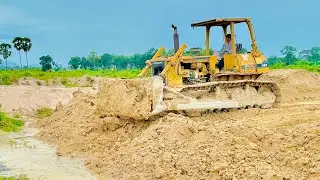 New project, digging soil to clear Chhouk Lake, Power Dozer D58P digging soil into sewage, perfect
