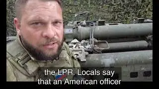 A war reporter shows the first US-made M-777 howitzer taken as a trophy by the LPR soldiers
