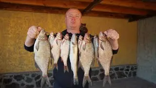 Fresh fish catch from the Dnieper River. Cooked delicious fried fish | Village Cooking